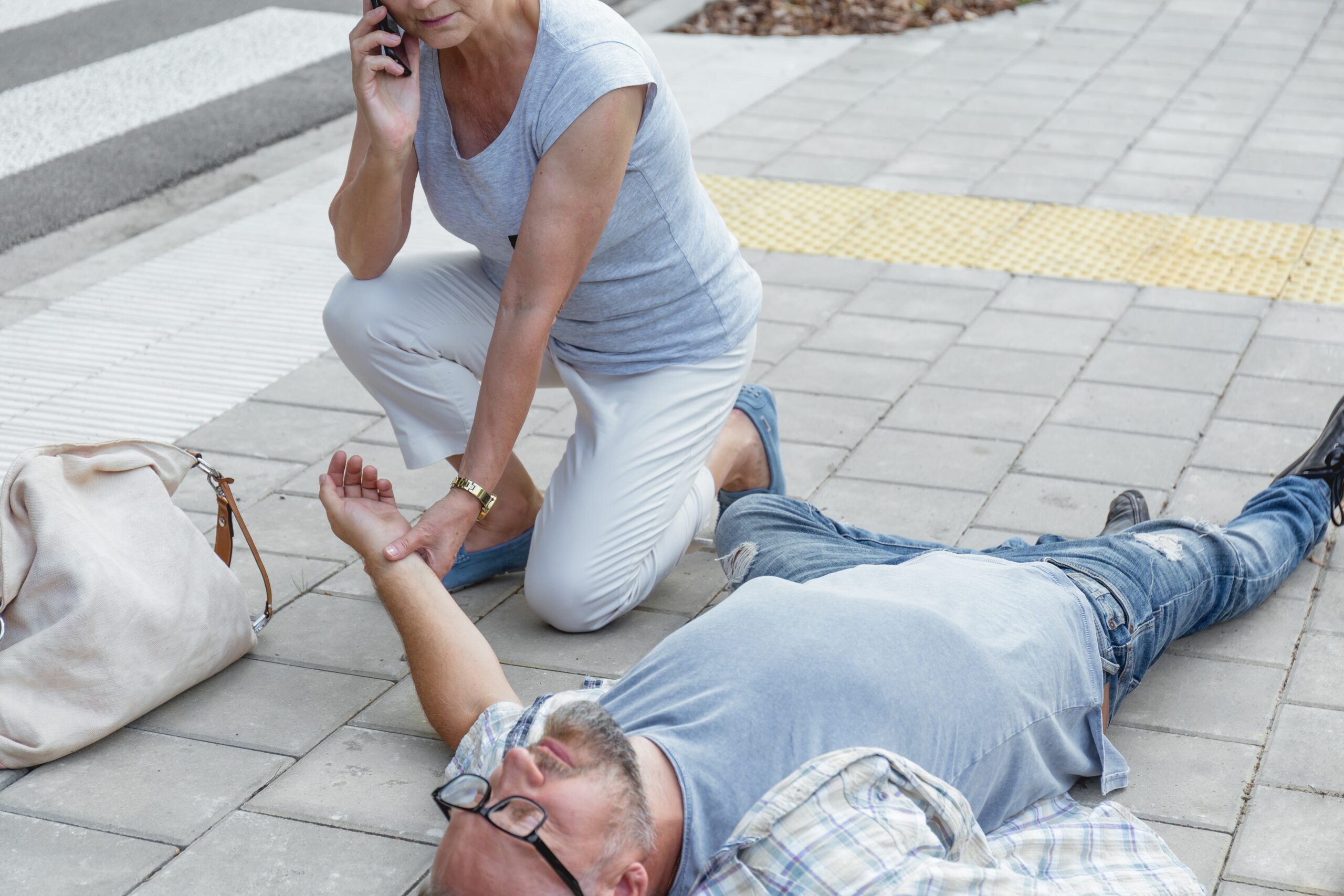 senior passerby kneels beside the person who faint 2026 03 10 02 11 15 utc scaled Letitia S. Johnson