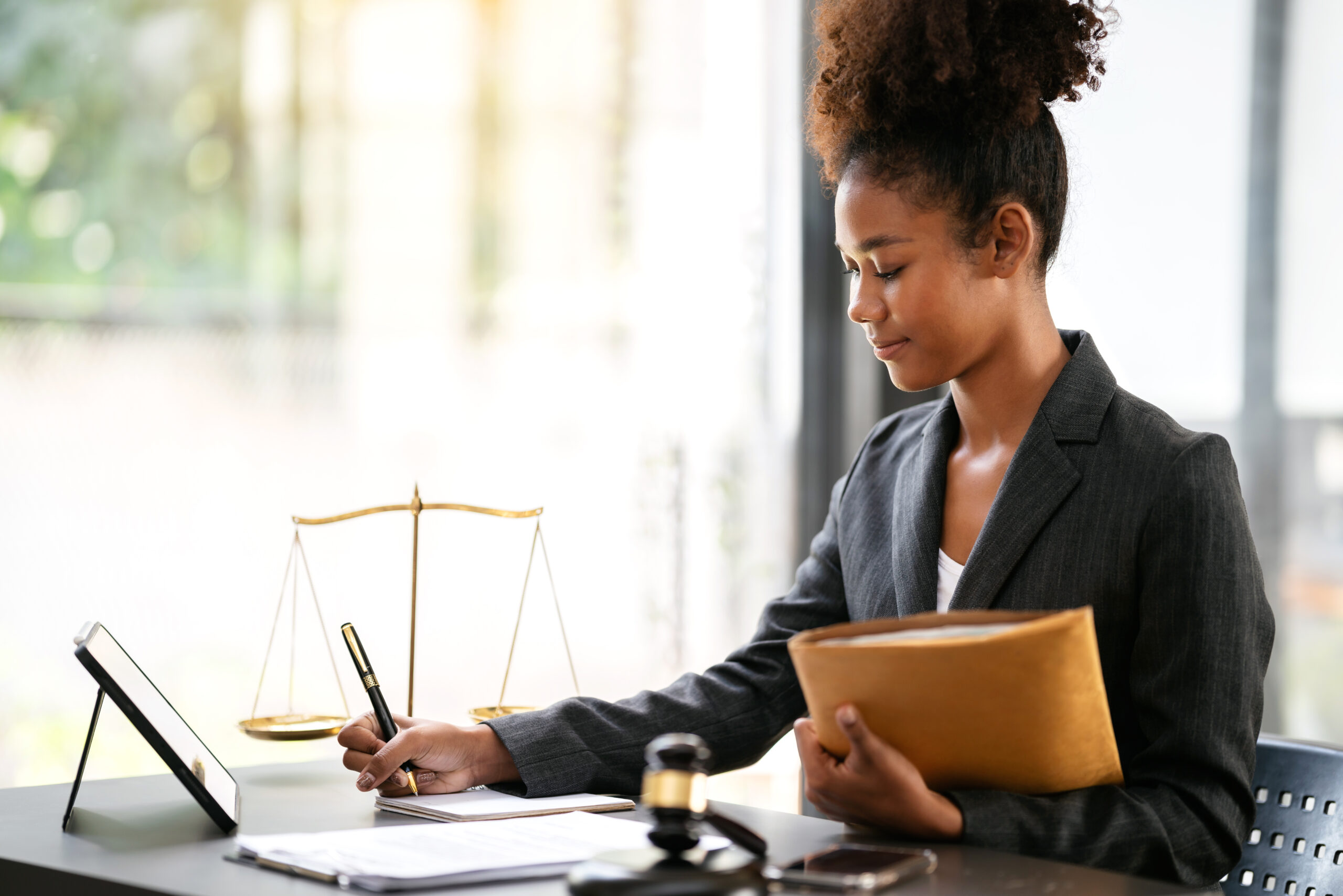professional woman working at desk in office 2026 01 05 06 03 45 utc scaled Letitia S. Johnson